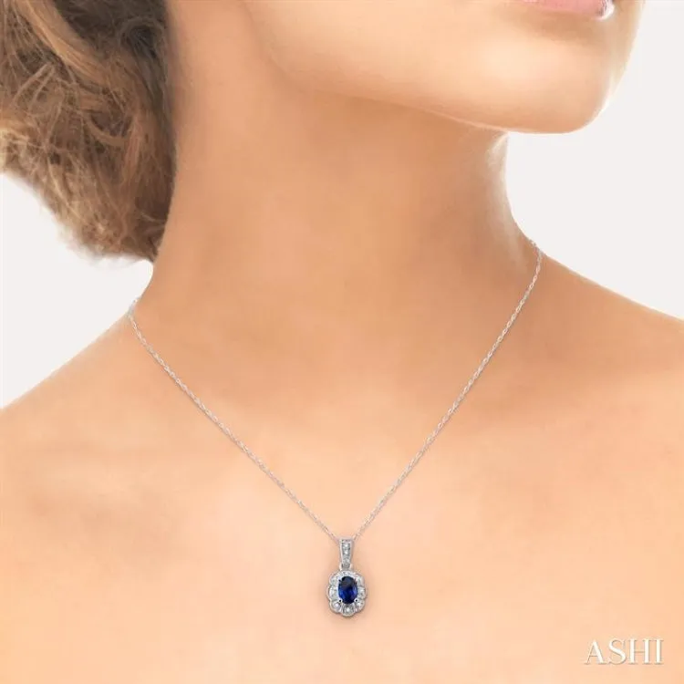 6x4mm Oval Cut Sapphire and 1/20 Ctw Single Cut Diamond Pendant in 10K White Gold with Chain